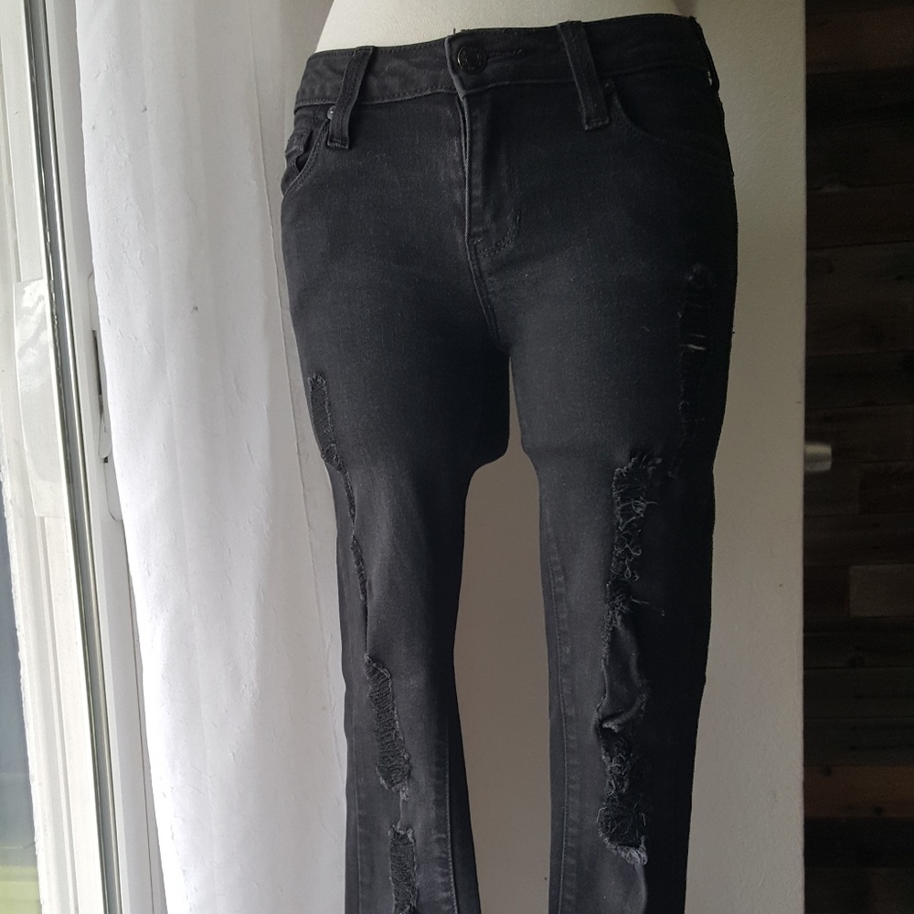 Distressed black extreme skinny jean